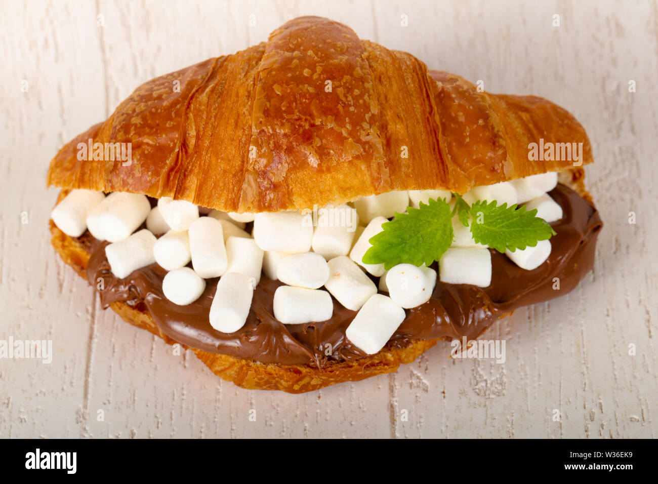 Croissant with marshmallow and chocolate Stock Photo Alamy