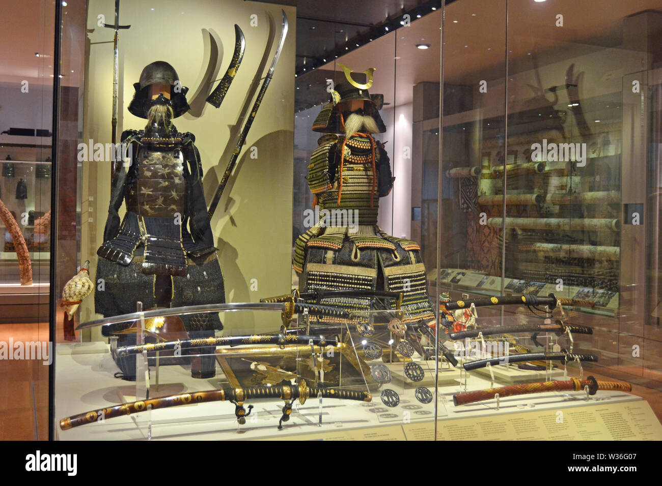 Japanese samurai warrior outfits on display at Manchester Museum, UK. Part of the University of Manchester Stock Photo