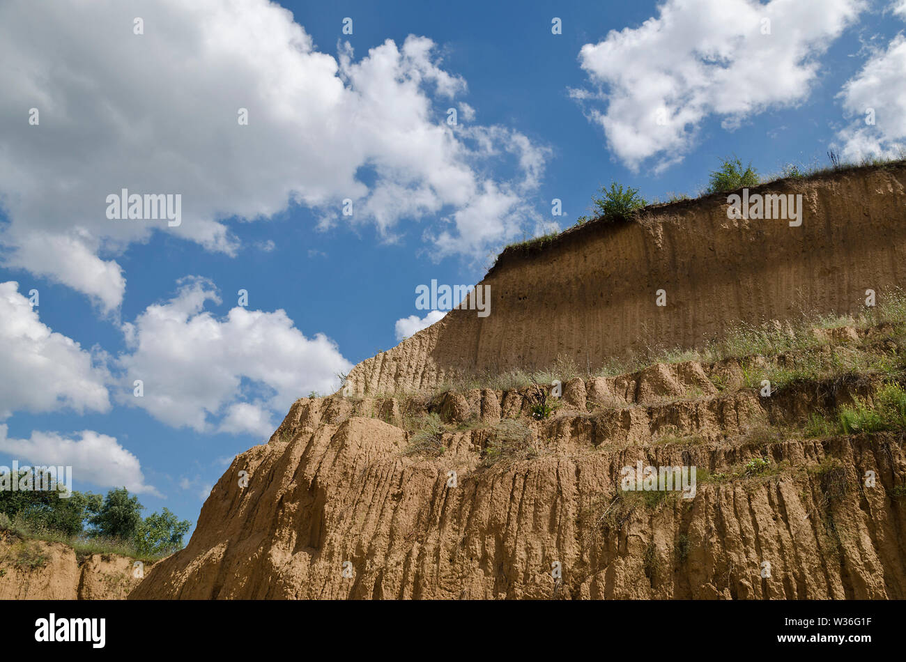 Sunny Blue Sky, soil and a hill near the city Ruse Stock Photo