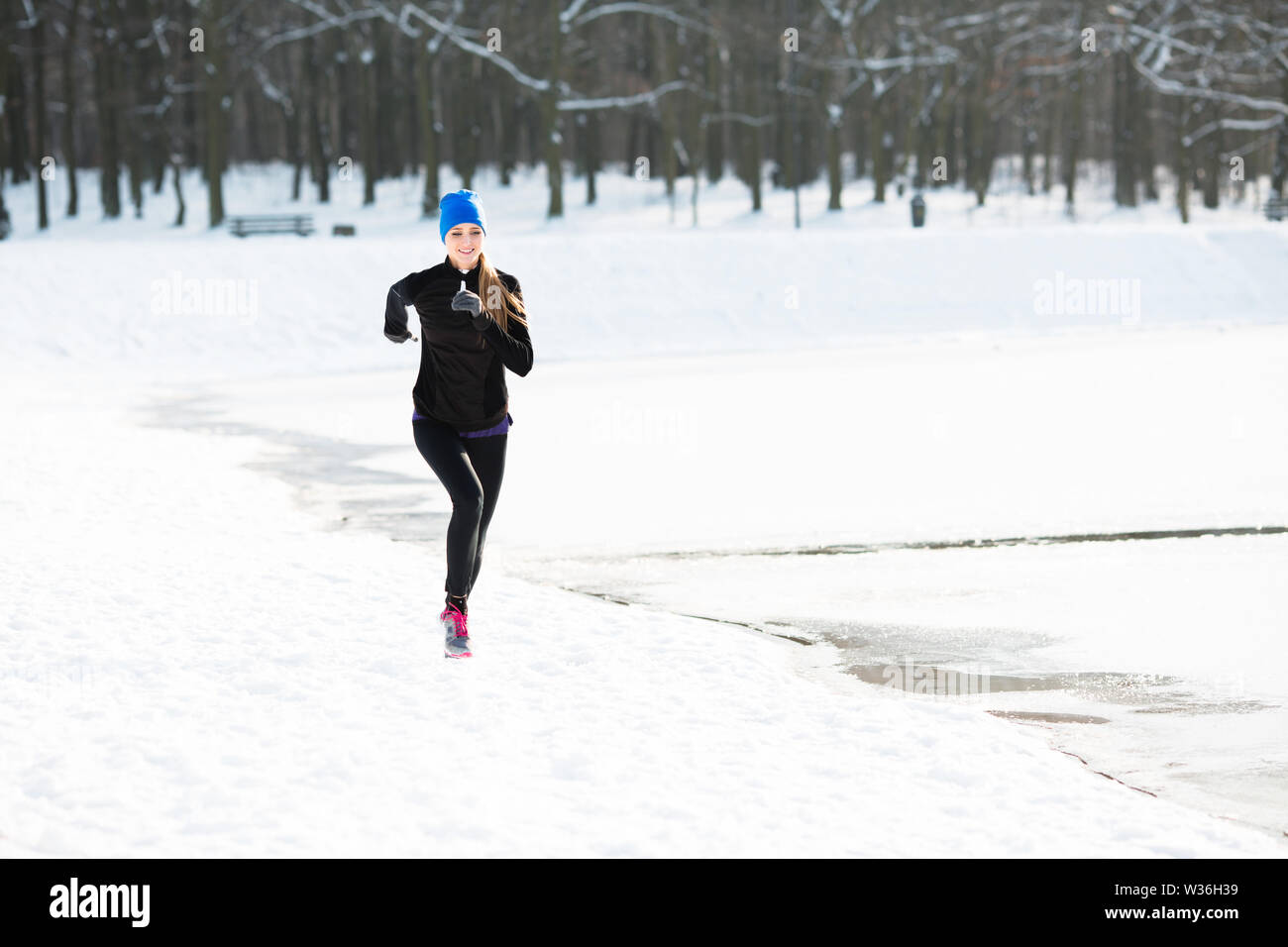 Blonde woman running park hi-res stock photography and images - Alamy