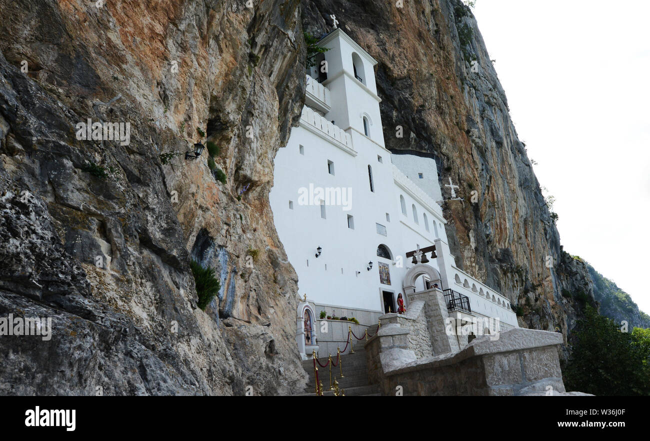 The Ostrog Monastery, set on a cliff 900 meters above the Zeta valley, is the most important Christian pilgrimage site in Montenegro. Stock Photo