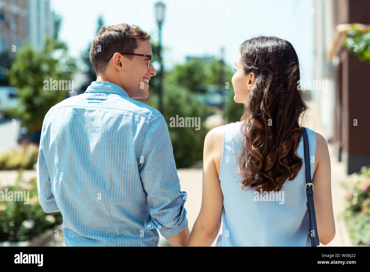 Happy man looking at his beautiful young wife Stock Photo