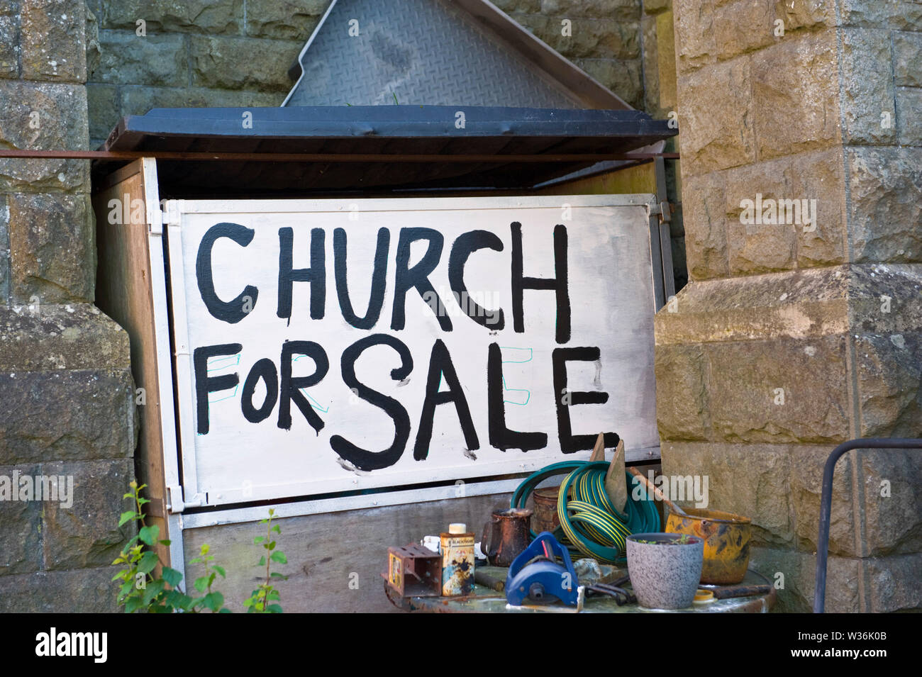 Antique and bric a brac warehouse in former church in the town centre at Builth Wells Powys Wales UK Stock Photo