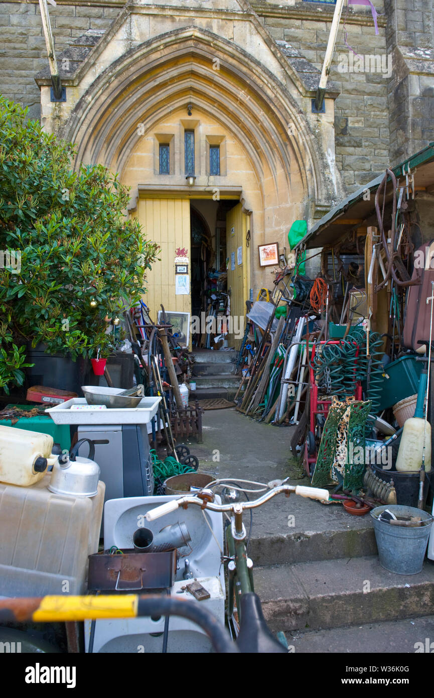 Antique and bric a brac warehouse in former church in the town centre at Builth Wells Powys Wales UK Stock Photo