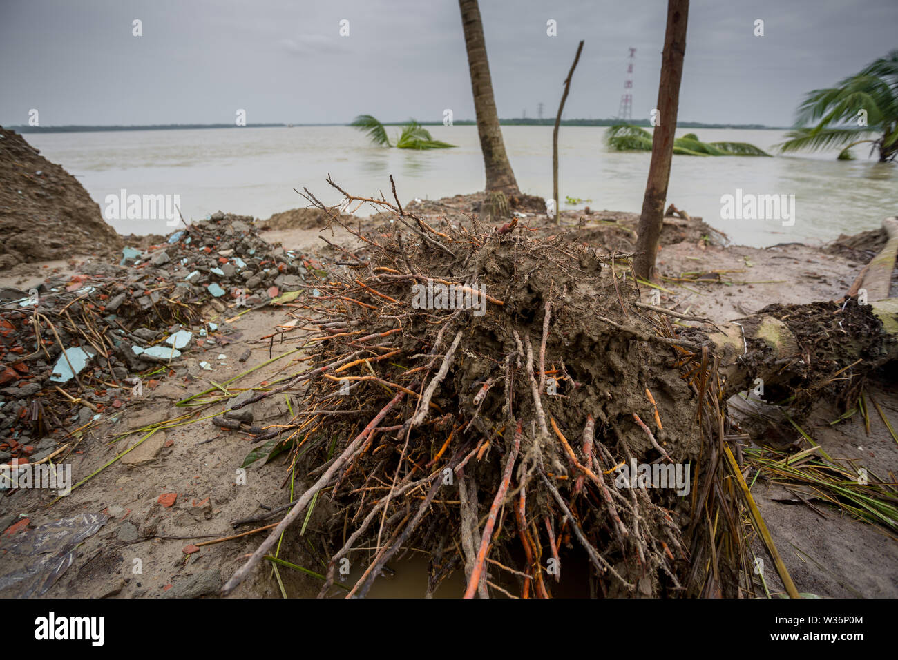Bangladesh – June 27, 2015: Massive effect of river erosion at Rasulpur, Barisal District. Stock Photo