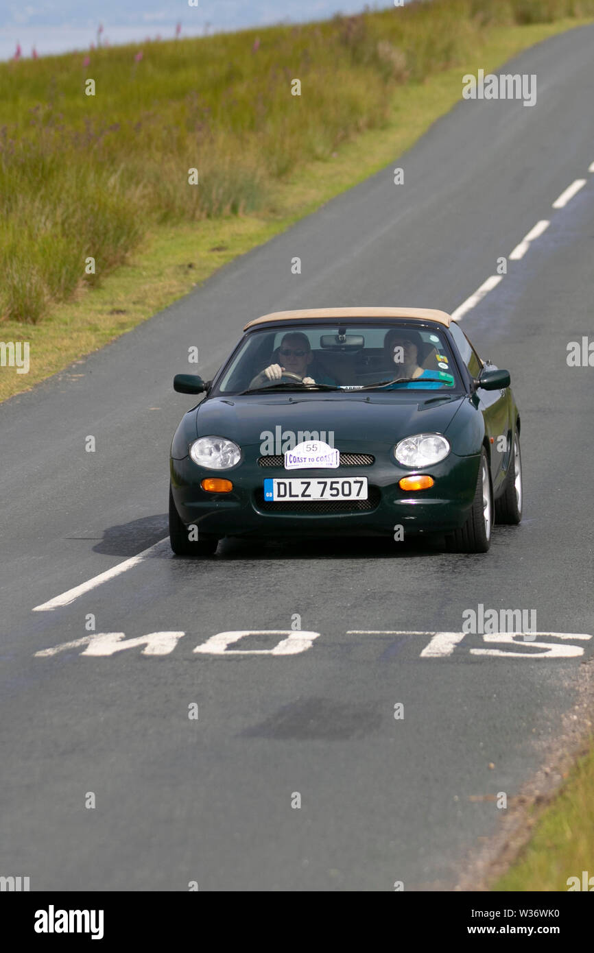 MG MGF 1.8i Abingdon at Scorton, Lancashire, UK..  UK Weather 13th July, 2019.Sunny conditions as the Lancashire Car Club Rally Coast to Coast crosses the Trough of Bowland. 74 vintage, classic oldtimers, collectible, heritage, historics vehicles left Morecambe heading for a cross county journey over the Lancashire landscape to Whitby. A 170 mile trek over undulating landscape as part of the car club annual event. Credit: MediaWorldImages/Alamy Live News Stock Photo