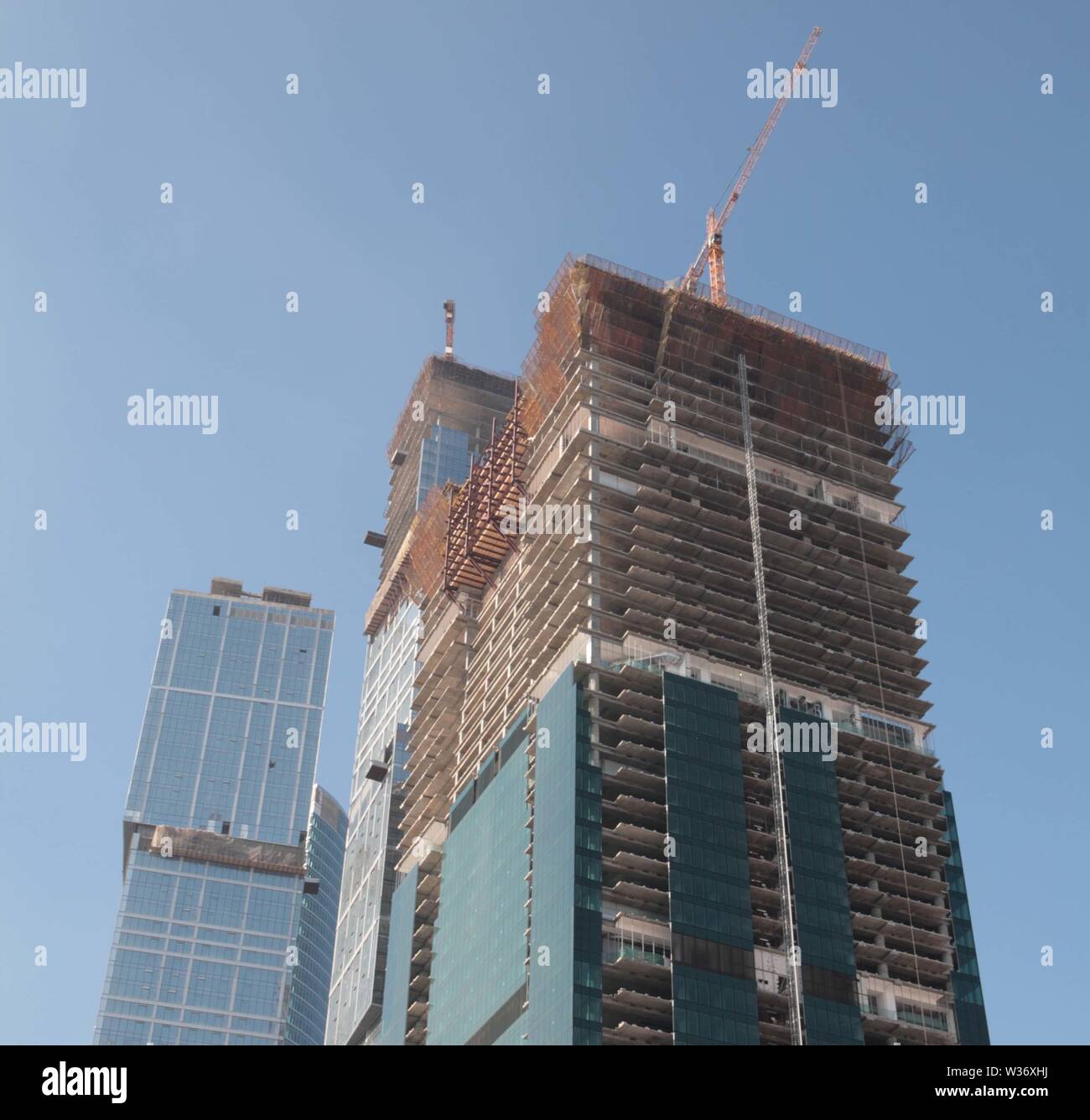 skyscraper develop on sky background at day Stock Photo - Alamy