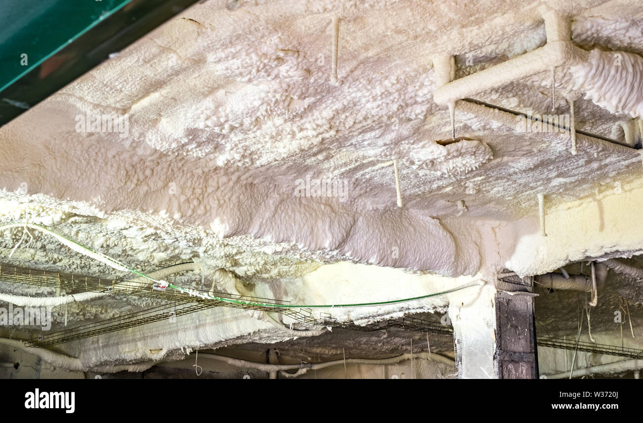 thermal insulation with foam on the ceiling Stock Photo Alamy
