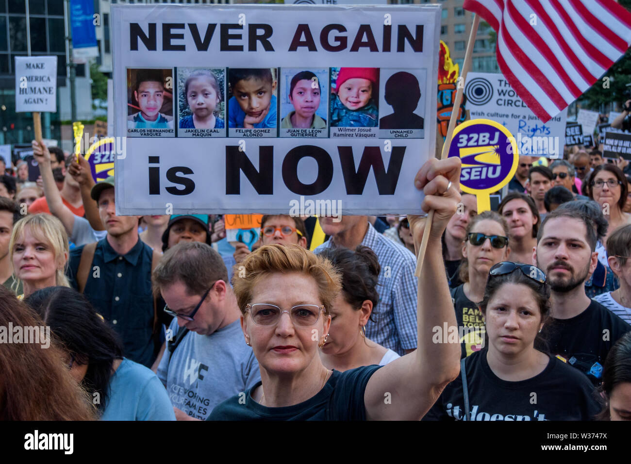 New York, USA. 12th July, 2019. Thousands of advocates, activists and community members flooded the streets at Foley Square, across from the Immigration and Customs Enforcement (ICE) New York Field Office on July 12, 2019 to join New Sanctuary Coalition and The New York Immigration Coalition at the Lights for Liberty vigil, deemed one of the largest solidarity actions in history with over 750 vigils across 5 continents. A light was lit for all those held in U.S. detention camps and to bring light to the darkness of the Trump administration's horrific policies. Credit: PACIFIC PRESS/Alamy Live  Stock Photo