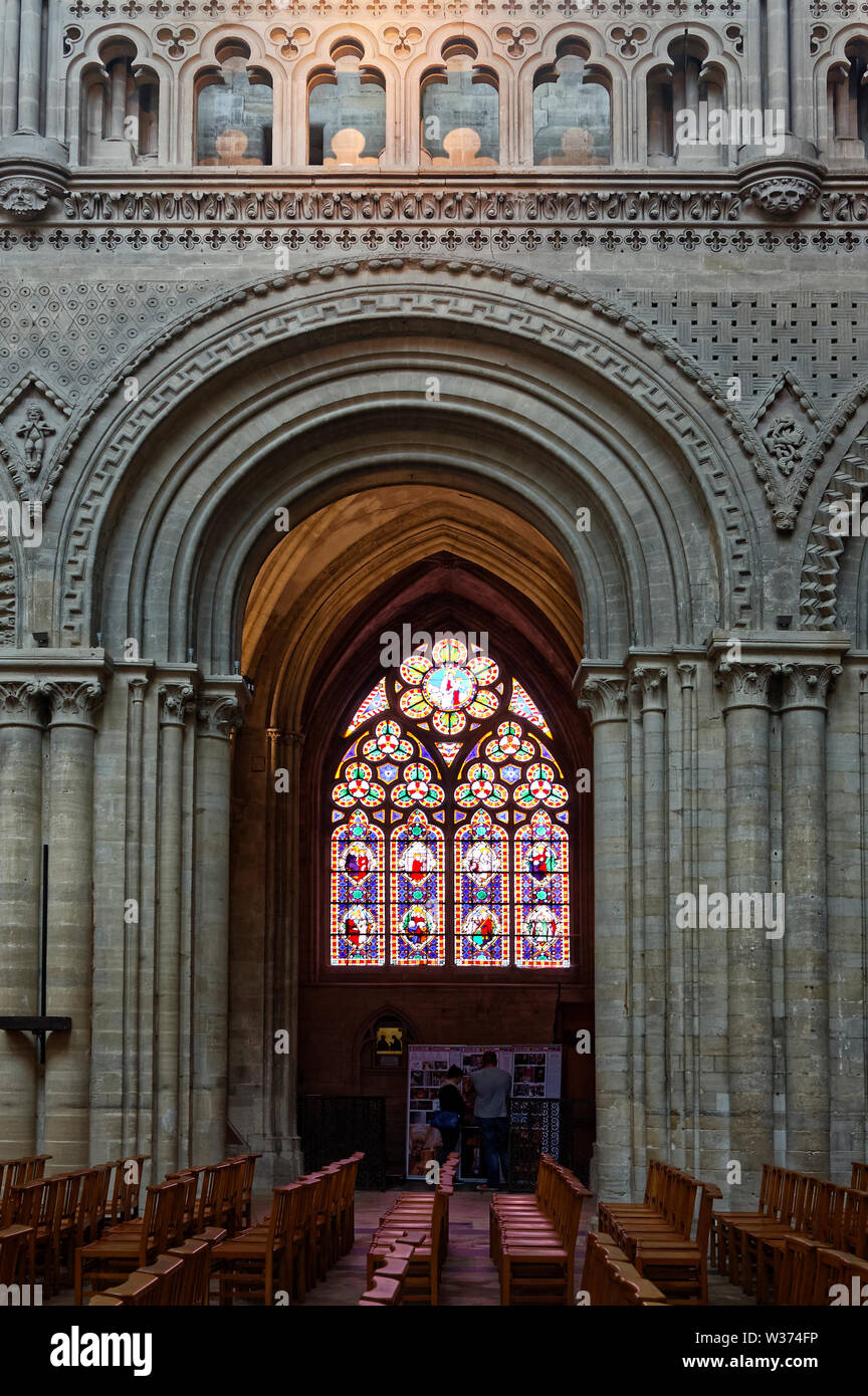 Notre Dame Cathedral; 1077; interior, stained glass window, Norman then Gothic architecture, stone arch, medieval; Catholic church; old religious buil Stock Photo