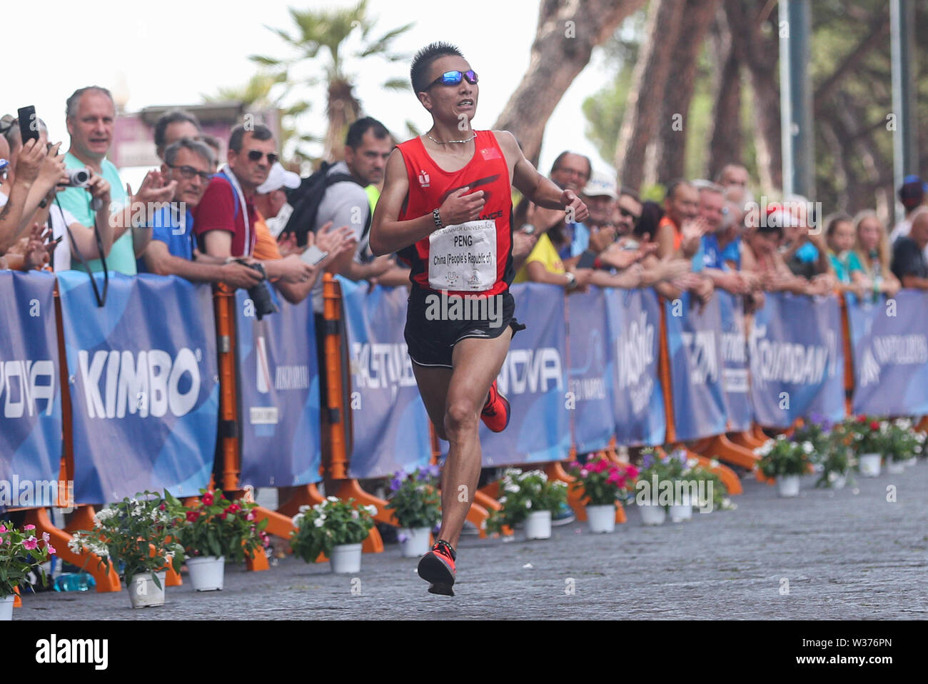 Naples, Italy. 13th July, 2019. Peng Jianhua of China sprints to the ...