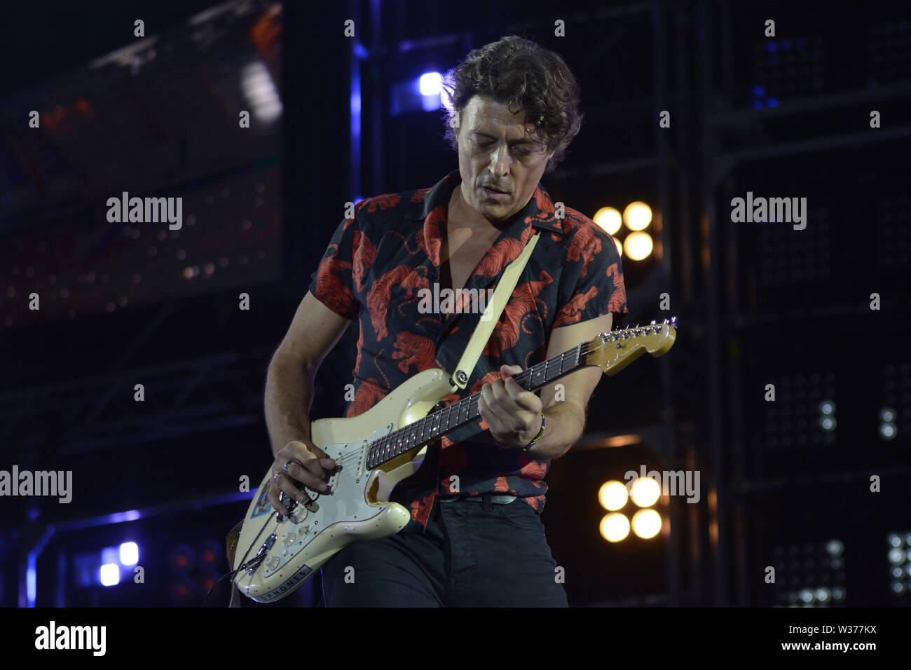 Rome, Italy. 12th July, 2019. The Italian guitarist Federico Poggipollini performs on stage for Luciano Ligabue at the Stadio Olimpico in Rome for his 'Start Tour 2019'. Credit: Mariano Montella/Pacific Press/Alamy Live News Stock Photo