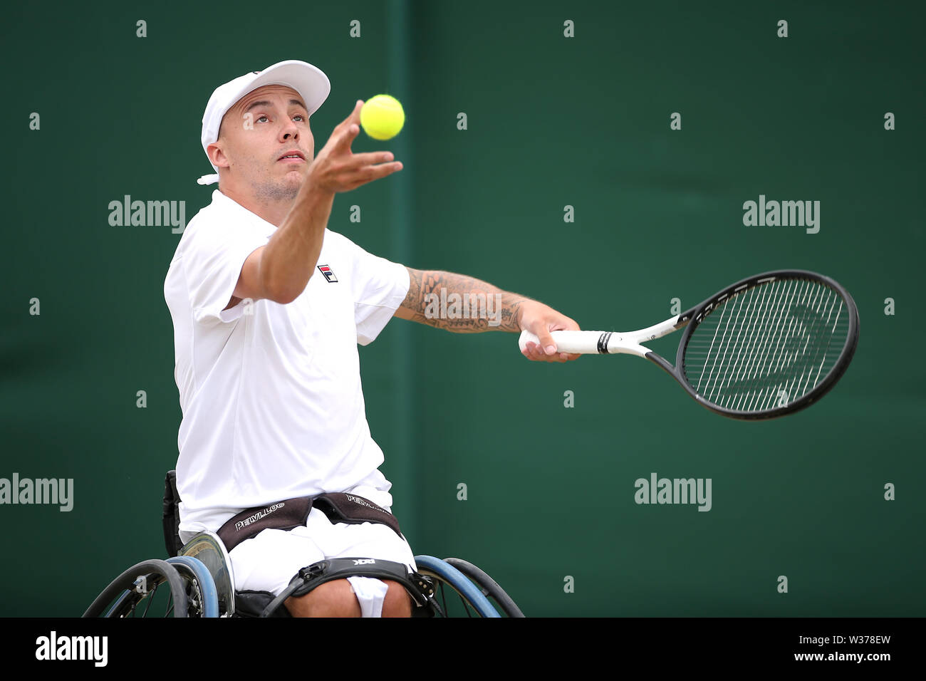 Andy Lapthorne in the men's quad wheelchair singles against Dylan Alcott on day twelve of the Wimbledon Championships at the All England Lawn Tennis and Croquet Club, Wimbledon. Stock Photo