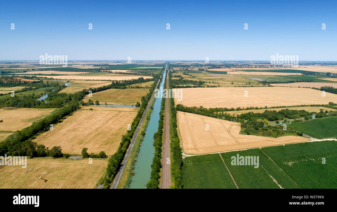 Aerial view of a canal and a railroad in the Poitevin marsh, France Stock Photo