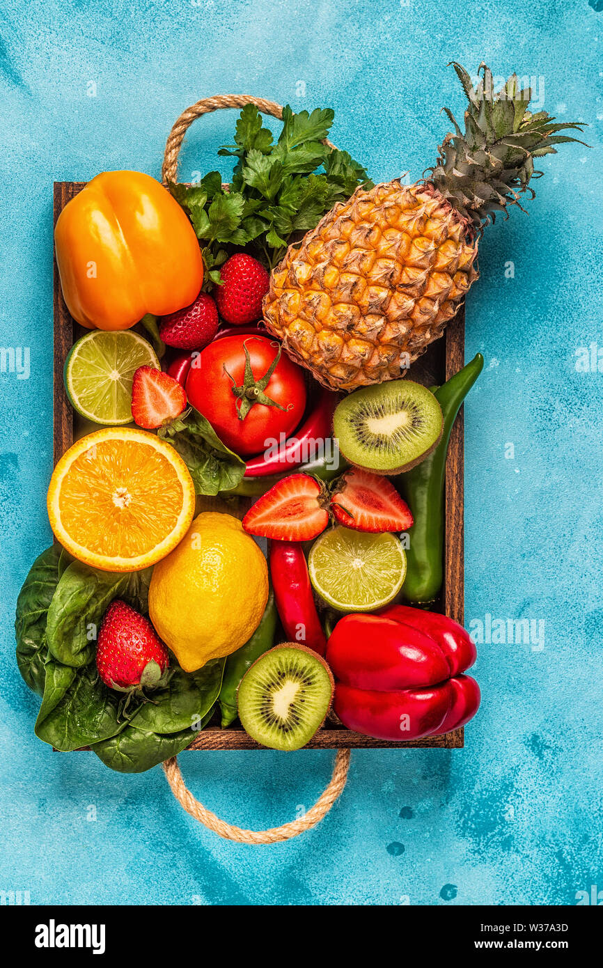 Fruits and vegetables rich in vitamin C in box. Healthy eating. Top view Stock Photo