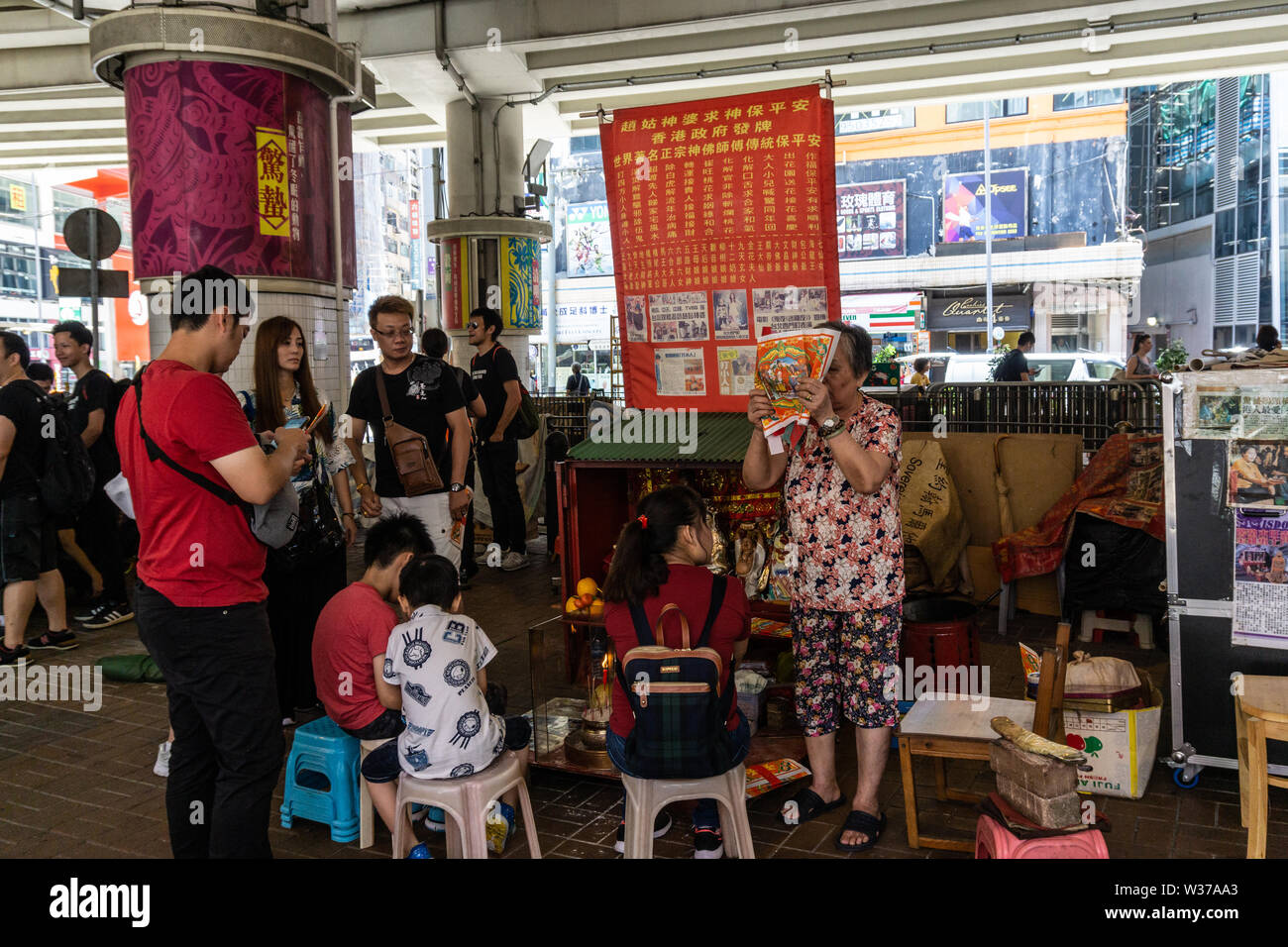 Good luck ceremony performed on street in Hong Kong Stock Photo