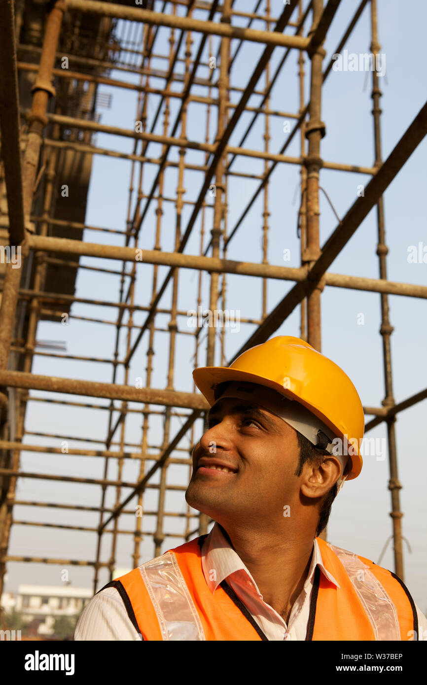 Architect at construction site Stock Photo - Alamy