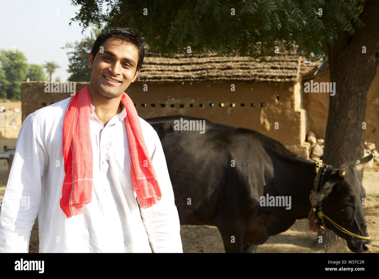 Portrait of a farmer smiling Stock Photo - Alamy