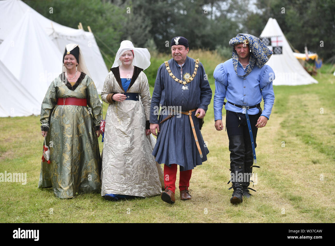 Medieval re-renactors attend the Tewkesbury Medieval Festival at Tewkesbury Battlefield in Gloucestershire. Stock Photo