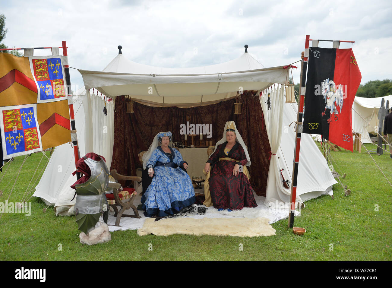 Medieval re-renactors attend the Tewkesbury Medieval Festival at Tewkesbury Battlefield in Gloucestershire. Stock Photo