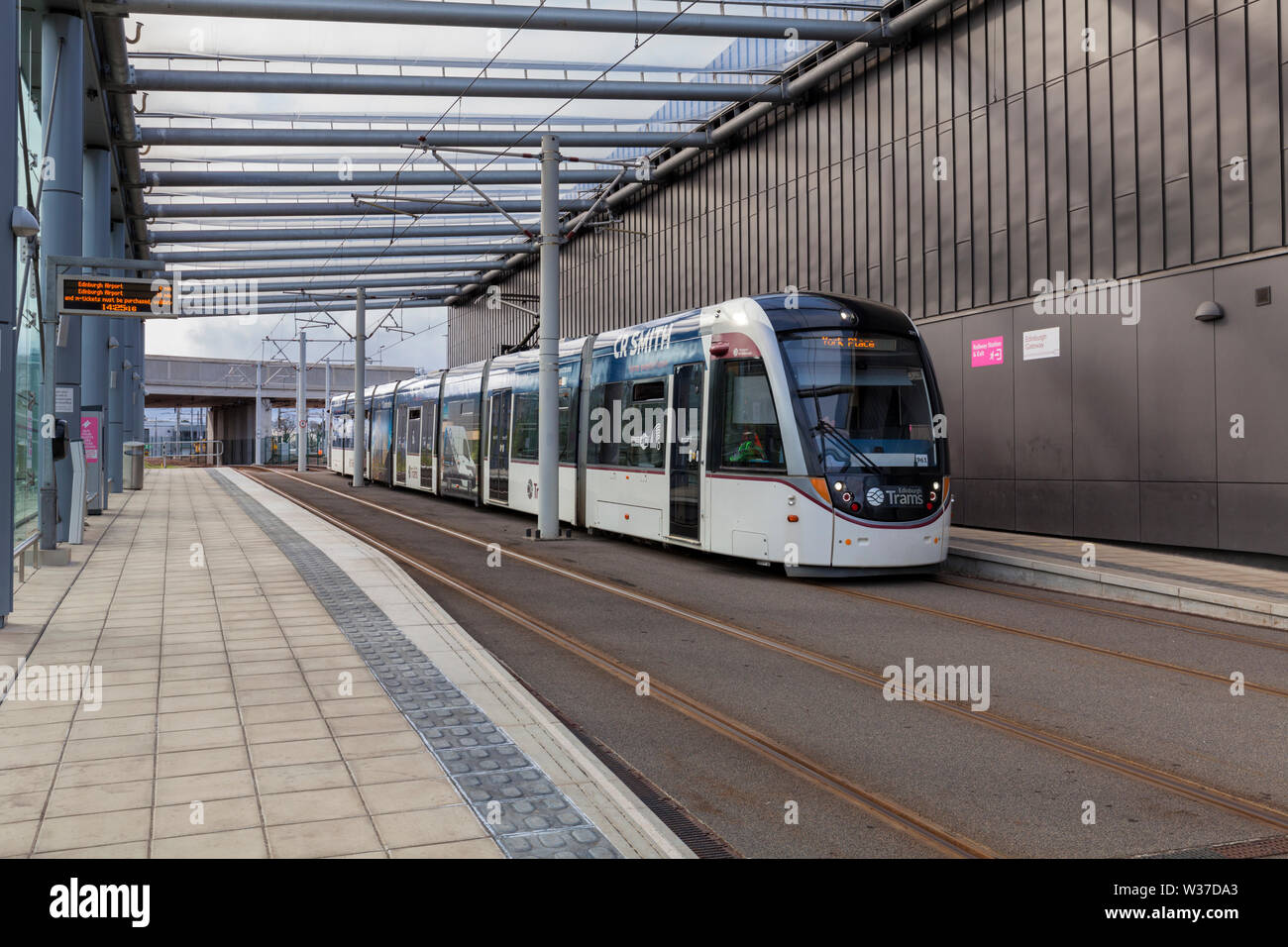 Edinburgh tram 277 at Edinburgh Gateway railway station while working a Edinburgh Airport - York Place service Stock Photo