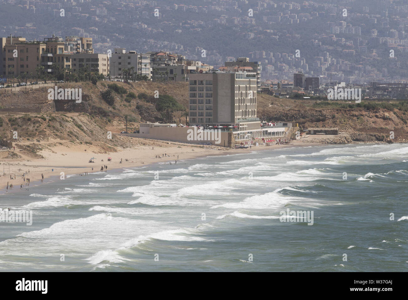 July 13, 2019 - Beirut, Lebanon - A crowded beach in West Beirut, on a hot summer day. (Credit Image: © Amer Ghazzal/SOPA Images via ZUMA Wire) Stock Photo