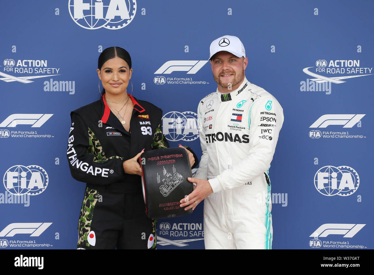 &#xa9; Photo4 / LaPresse13/07/2019 Silverstone, England Sport Grand Prix Formula  One England 2019 In the pic: Pole Position Pirelli Award, Mabel (GBR)  Singer and Songwriter with Valtteri Bottas (FIN) Mercedes AMG F1