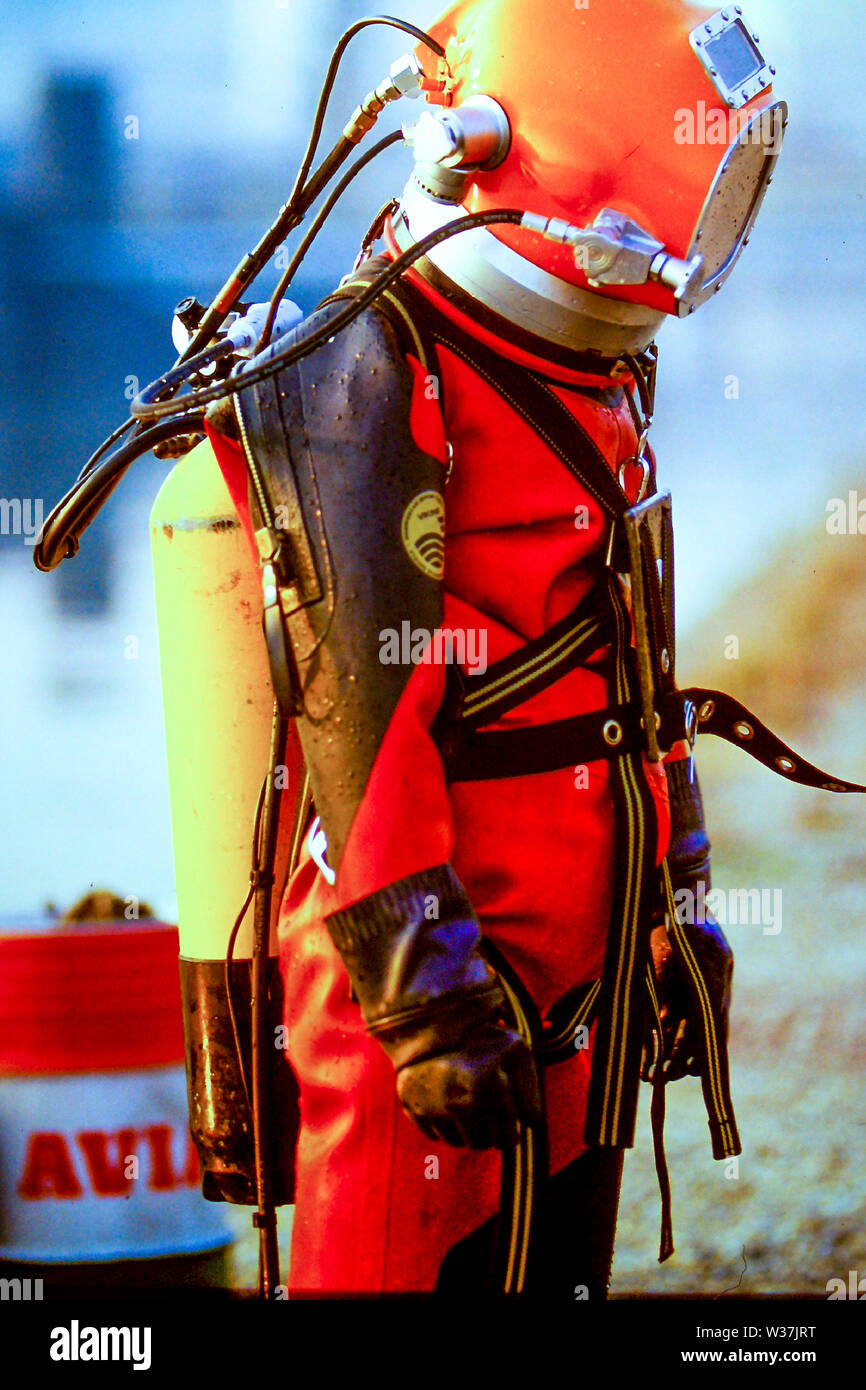Archives 90s: Firefighters test special diving suit made for interventions in hazardous chemical underwater environment, Edouard Herriot Harbor, Lyon, France Stock Photo