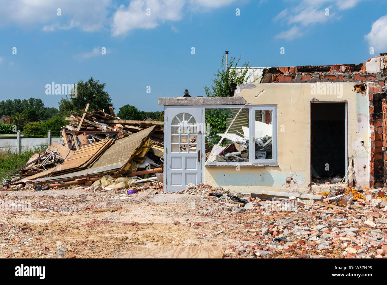 Sint Gillis Waas, Belgium, 11 July 2019, old House for a part broken off, the front door is still standing Stock Photo