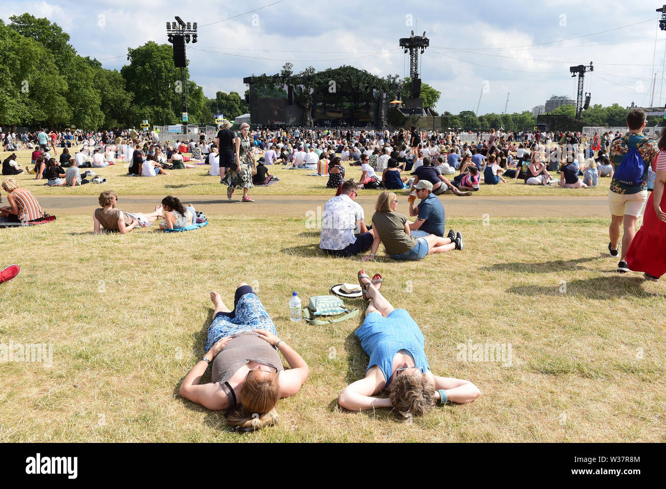 Festival goers enjoy warm weather during the British Summer Time