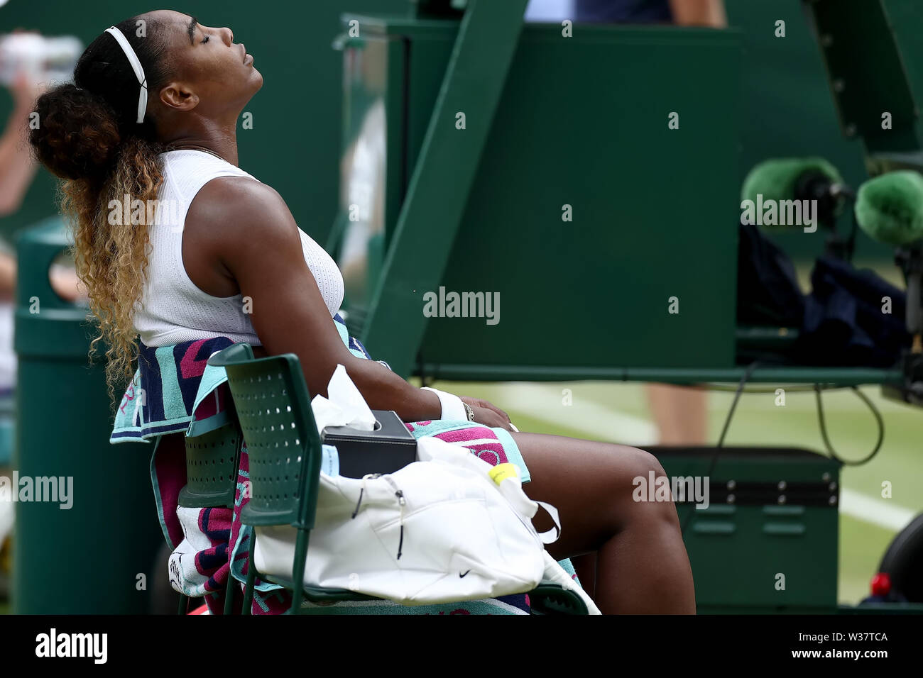 London, UK. 13th July, 2019. The All England Lawn Tennis and Croquet Club, Wimbledon, England, Wimbledon Tennis Tournament, Day 12; A dejected Serena Williams (USA) at the break as her serve is broke by Simona Halep (ROM) Credit: Action Plus Sports Images/Alamy Live News Stock Photo