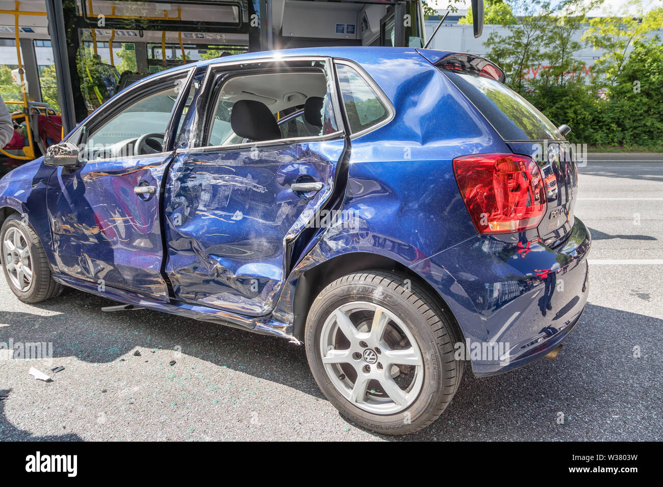 Blue Volkswagen Polo after road accident Stock Photo - Alamy
