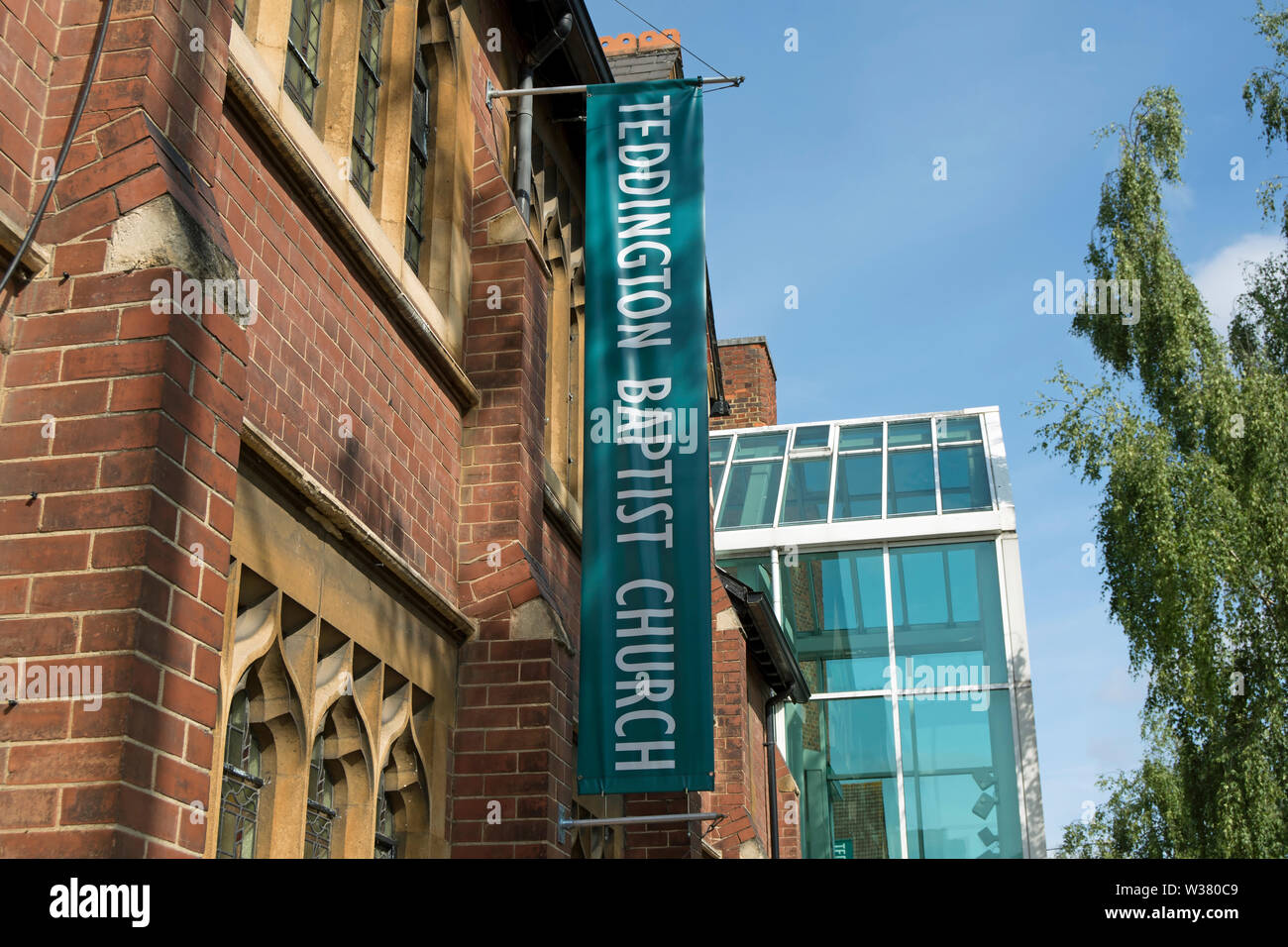 exterior with hanging banner of teddington baptist church, teddington, middlesex, england Stock Photo