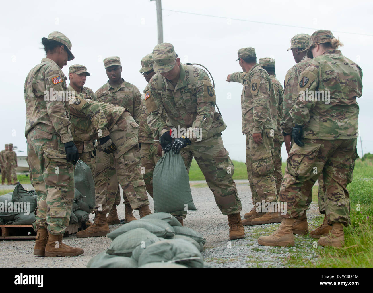 Army National Guard soldiers of the 2225 Multi-role Bridge Company fill sandbags at a Marina near and do other prep work.New Orleans and other parts of the Gulf of Mexico prepare for the Tropical Storm Barry to make landfall, bringing with it a catastrophic rainfall. With the Mississippi River's water level at an all-time high and a storm forming in the Gulf of Mexico that is expected to make landfall on the Louisiana and Texas coasts, many fear that levees will fail and that New Orleans will again be inundated as bad as it was in the 2004 aftermath of Hurricane Kartina. Stock Photo