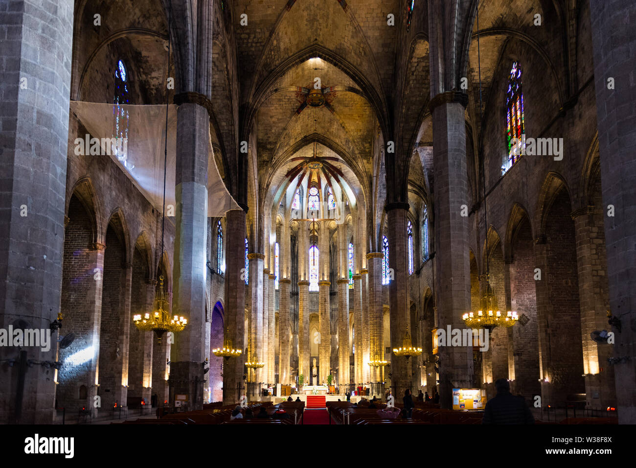 Interior of Santa Maria del Mar Basilica in typical Catalan Gothic style with pointed arches and high columns. La Ribera, Barcelona. Spain. Stock Photo
