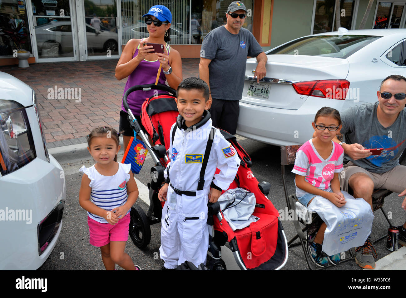 Cocoa Beach, Florida, USA. July 13, 2019. See our heroes as they ride through the City of Cocoa Beach in convertible Corvettes and witness the future of technology and innovation throughout the space industry! Former Apollo 15 Astronaut Al Worden with Space Shuttle Astronauts recreate the historic “Astronaut Corvette parade of the 60's.” Photo Credit: Julian Leek/Alamy Live News Stock Photo