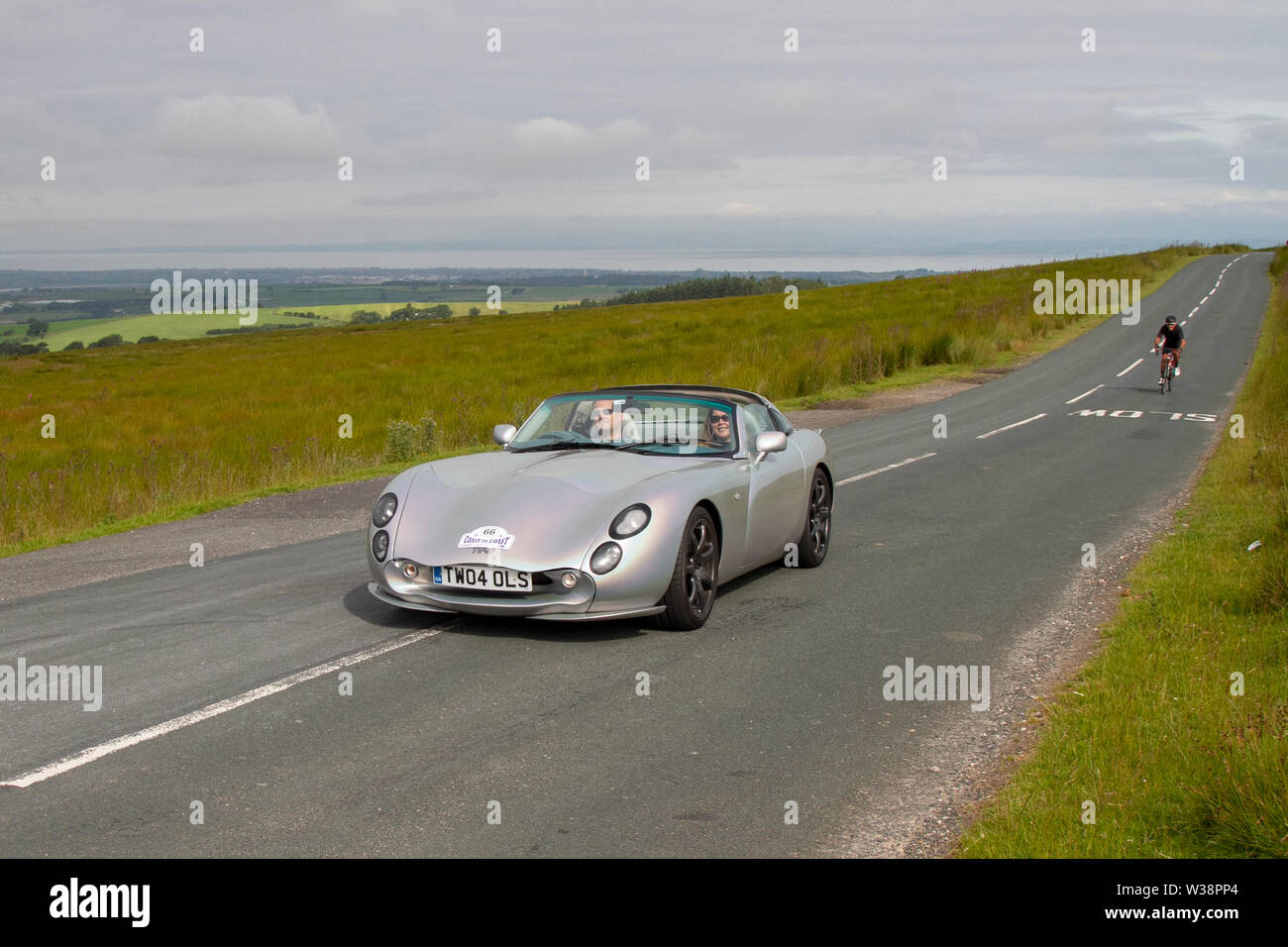 2004 Tvr Tuscan S Scorton, Lancashire. UK Weather 13th July, 2019. Sunny conditions as the Lancashire Car Club Rally Coast to Coast crosses the Trough of Bowland. 74 vintage, classic, collectible, heritage, historics vehicles left Morecambe heading for a cross county journey over the Lancashire landscape to Whitby. A 170 mile trek over undulating landscape as part of the classics on tour car club annual event. Stock Photo