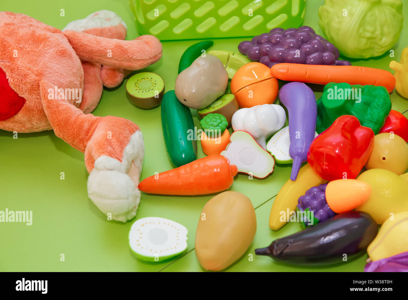 Toy fruits and grasszs . Fake fruits and vegetables .Plastic childrens