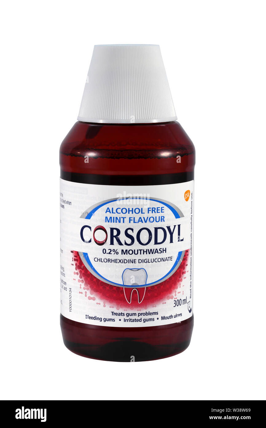 A 300ml bottle of GSK Corsodyl 0.2% chlorohexidine digluconate alcohol free mint flavour mouthwash isolated on a white background Stock Photo