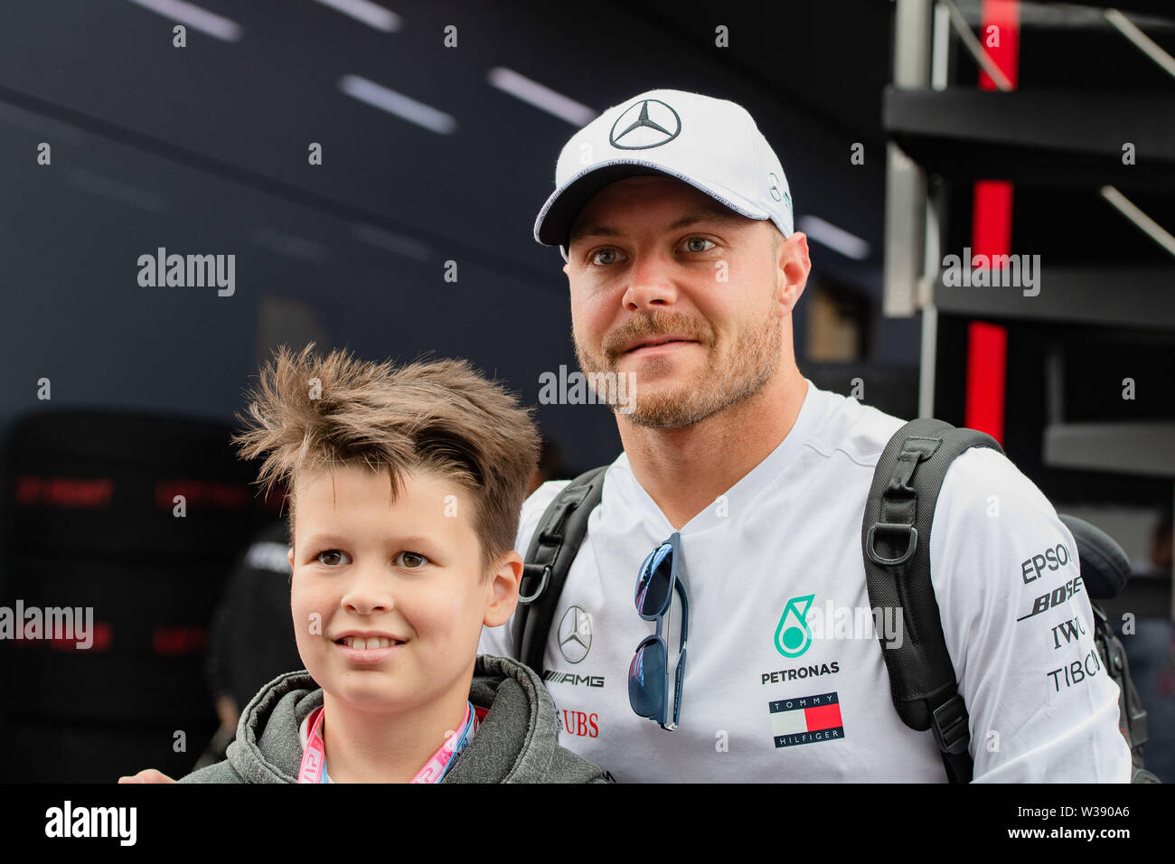 Towcester, UK. 13th Jul, 2019. Valtteri Bottas of Mercedes with his fan in  practice session 3 during Formula 1 Rolex British Grand Prix 2019 at  Silverstone Circuit on Saturday, July 13, 2019