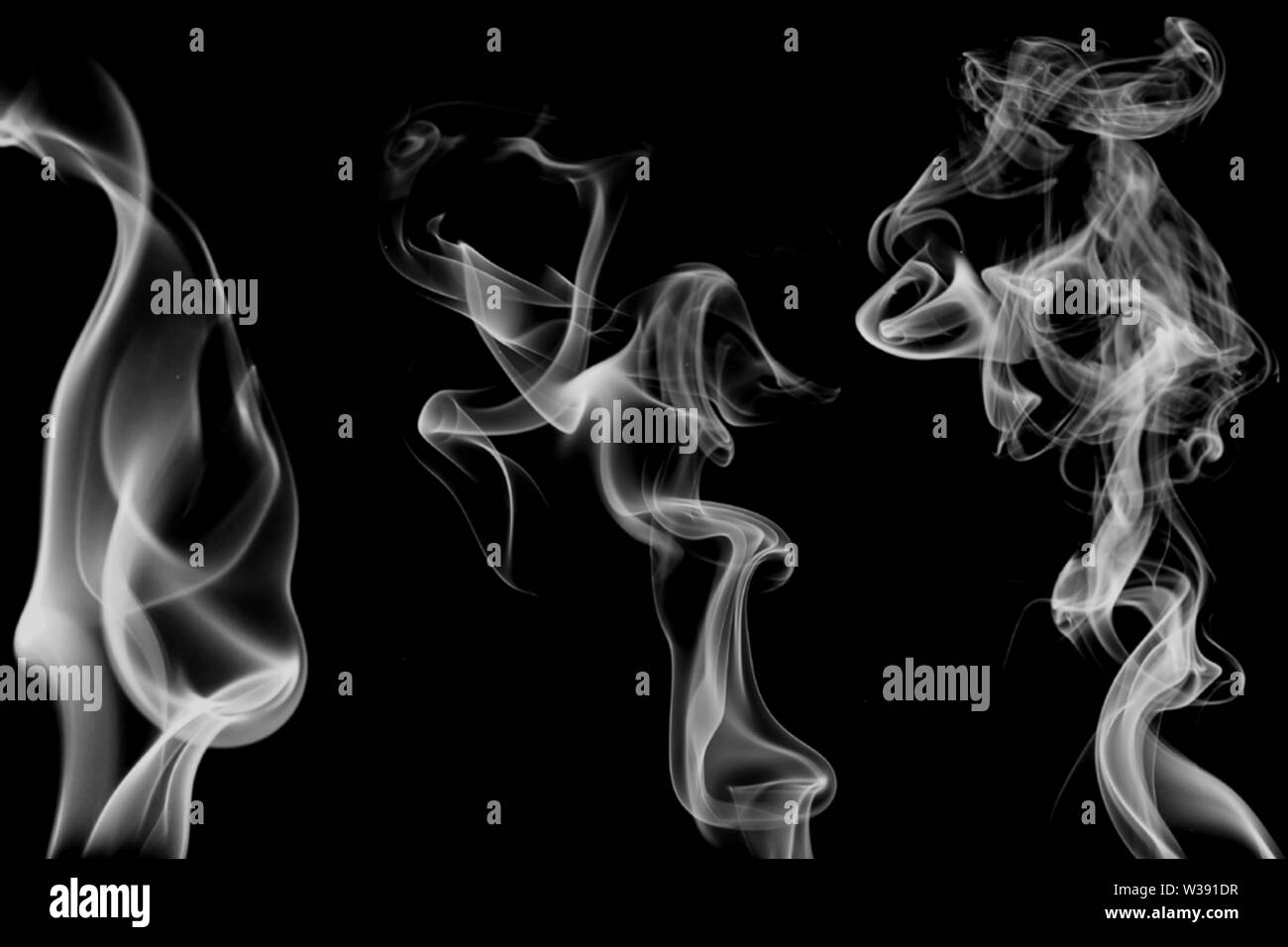 set of three smoke plumes on black background Stock Photo