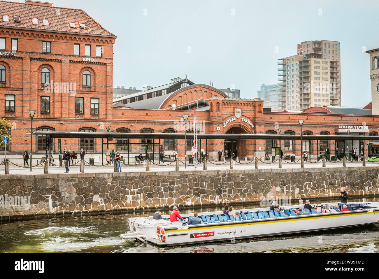 sightseeing boat in front of Malmoe central station Stock Photo
