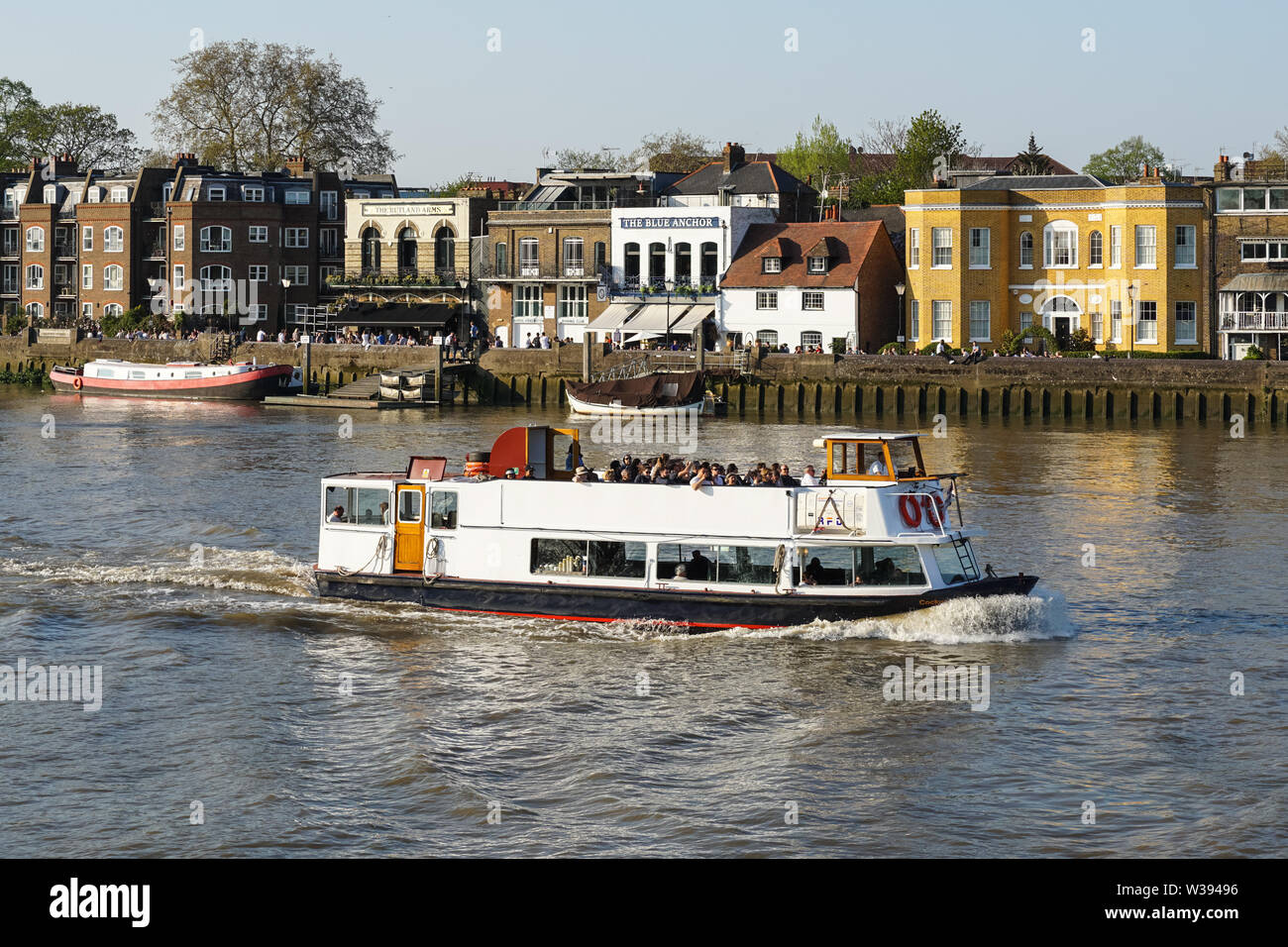 Cruise boats on the River Thames in Hammersmith, London, England