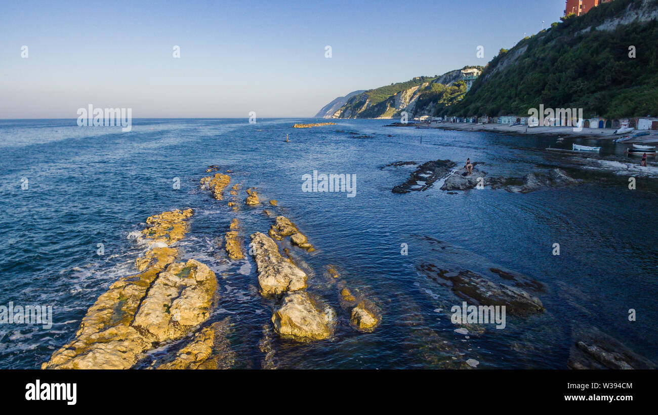 Passetto beach and Seggiola del Papa rock from above Stock Photo - Alamy