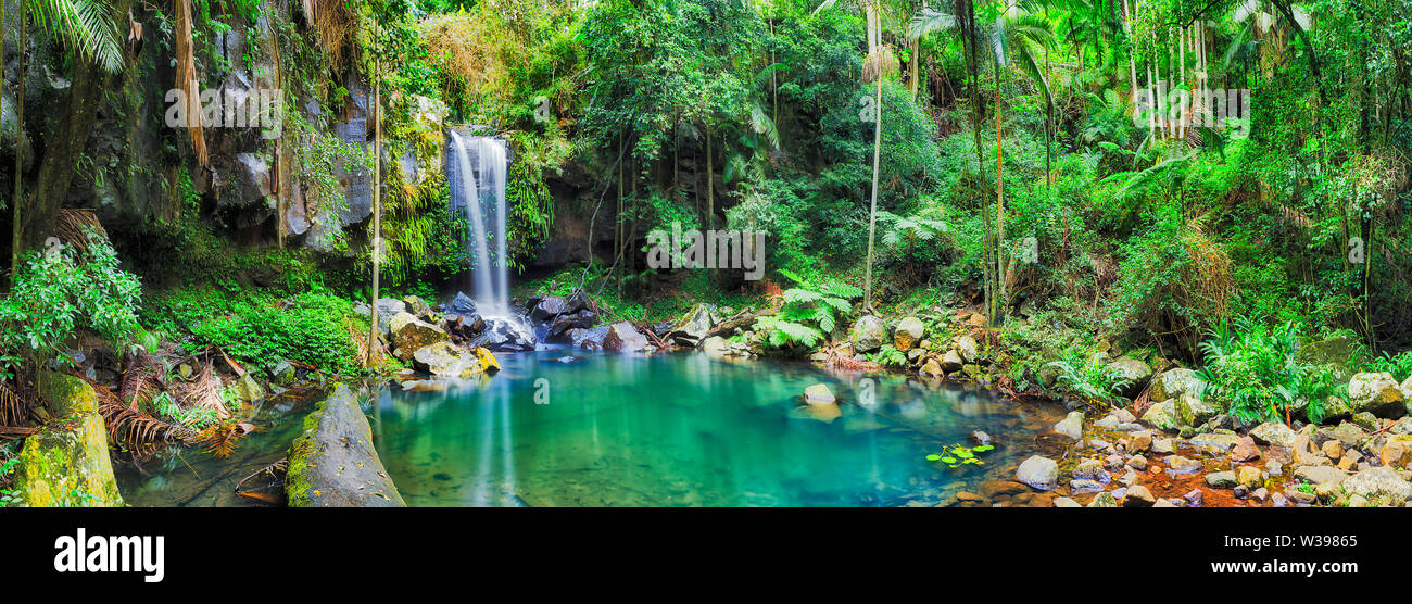 Clean fresh water pool between rocks formed by waterfall cutting