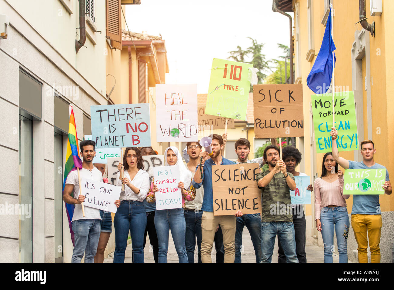 Activist Protesting Group of activists is protesting outdoors - Crowd demonstrating against ...