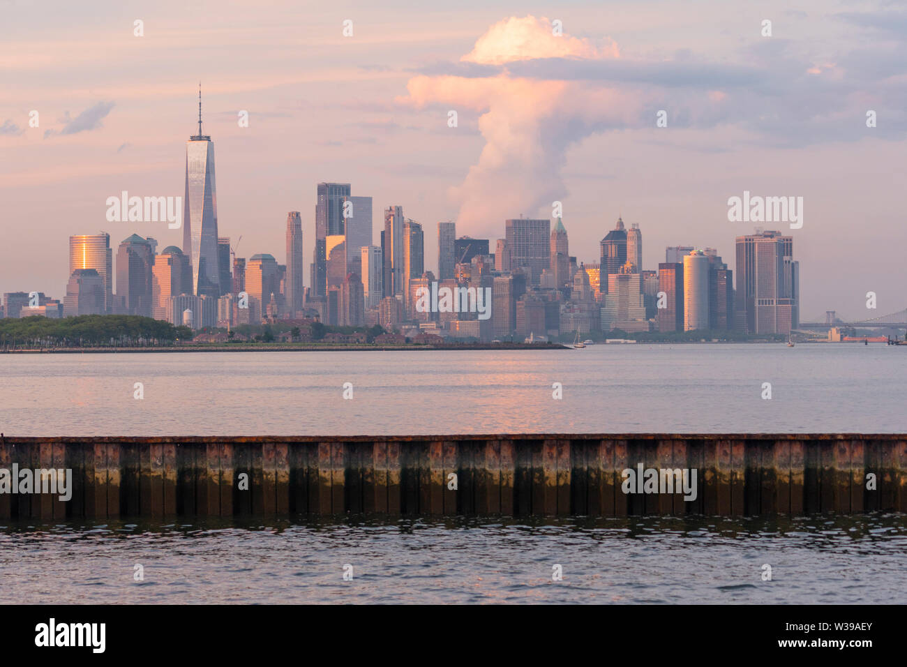 Manhattan is one of 5 Burroughs that make up New York City shown here at sunset Stock Photo