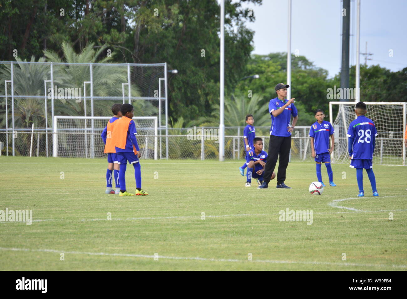 Venezuelan teenagers practicing football Stock Photo - Alamy