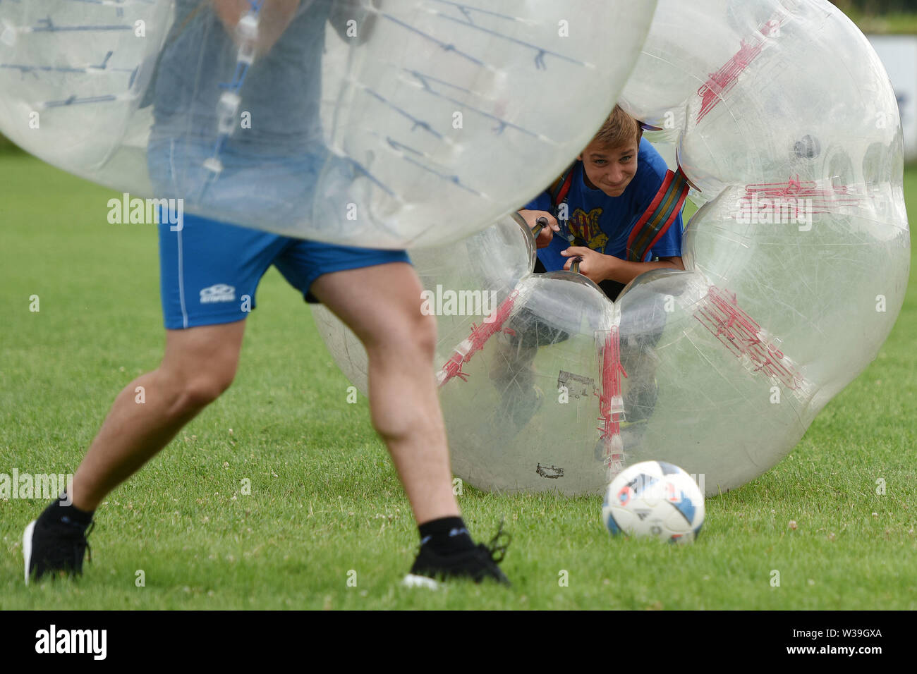 Vratisinec, Croatia. 13th July, 2019. People play Bubble Football, a  recreational sport similar to zorb, in Vratisinec village of Medimurje  County, Croatia, on July 13, 2019. Credit: Vjeran Zganec  Rogulja/Xinhua/Alamy Live News