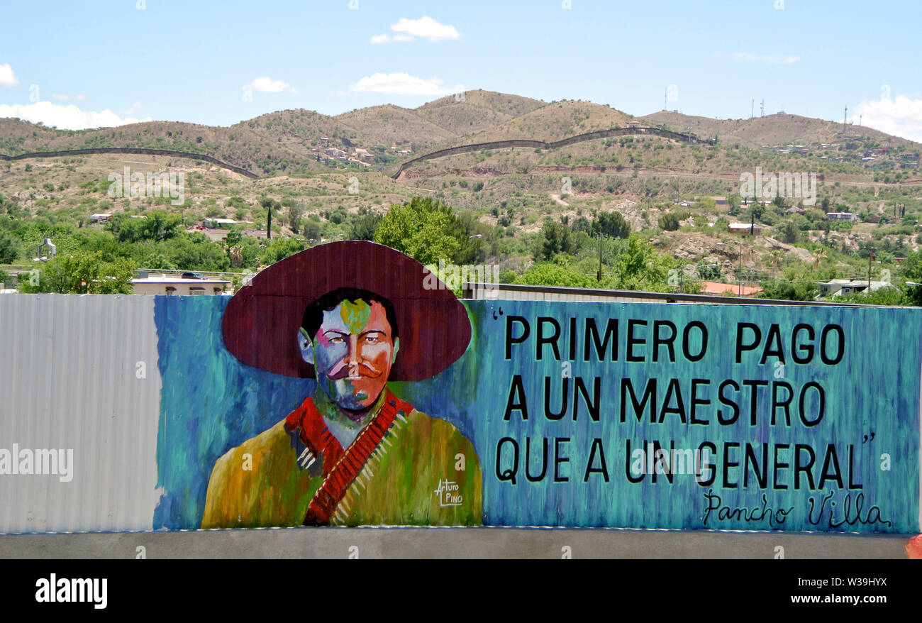 mural of general zapata in nogales arizona on the usa mexican border with the fence in the background Stock Photo